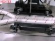 Máquina autómata para coser cuerdas y hacer los ojillos